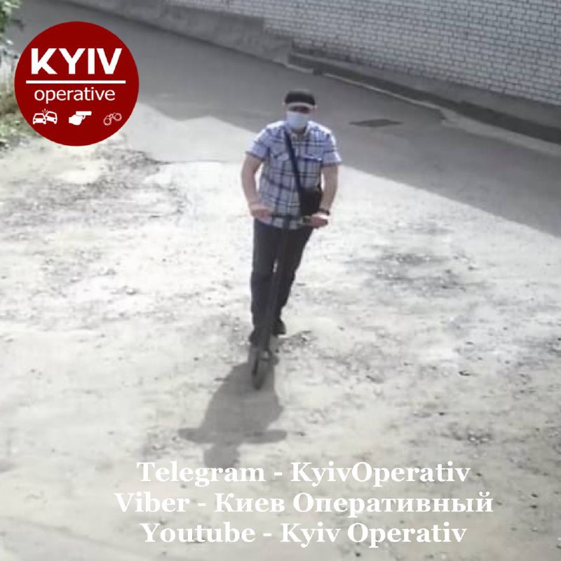 В Киеве вор на самокате обчищает авто (ФОТО)