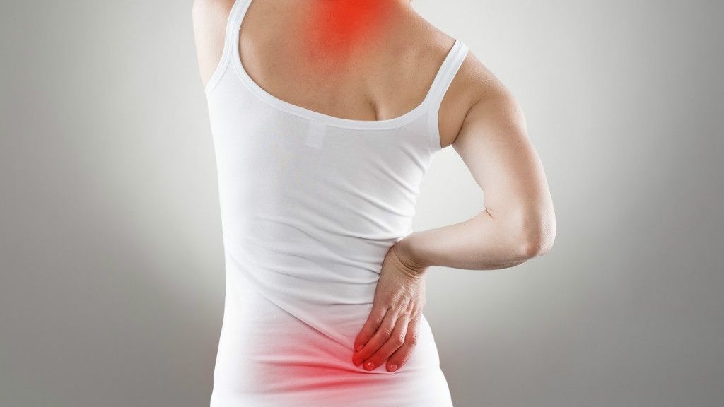 Названы самые популярные причины боли в спине
