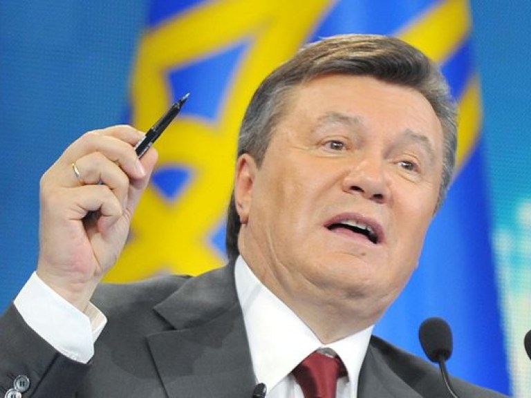 Янукович подписал законы о госдолге и снижении ставок налогов