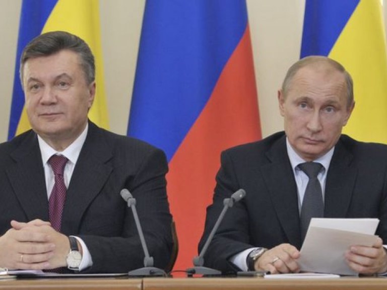 Путин пожелал Януковичу в новом году более тесных отношений с Россией