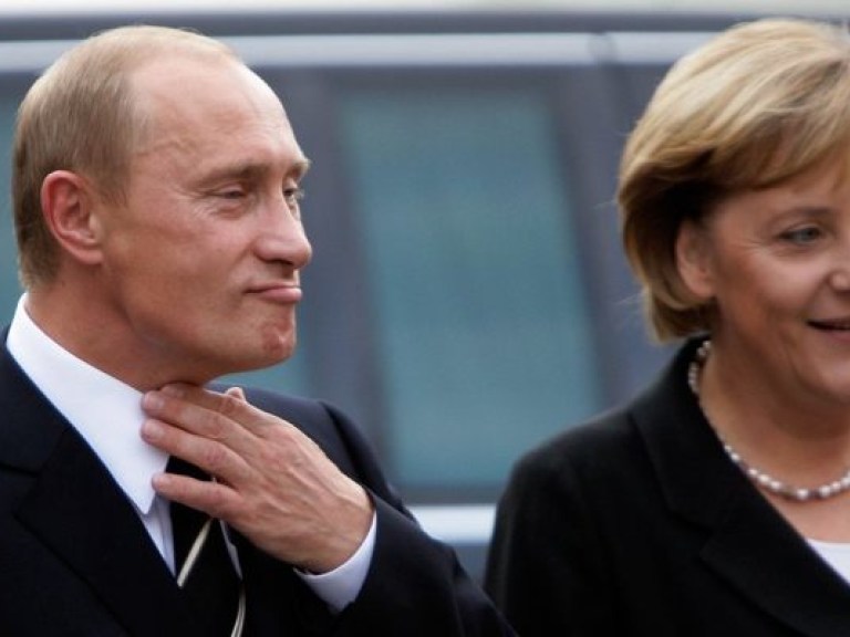 Путин пообещал Меркель частично отвести войска от границы с Украиной