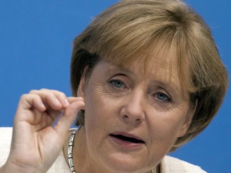 Меркель призвала Россию признать оценку ОБСЕ президентских выборов в Украине