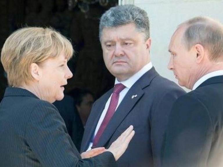 Порошенко и Путин все-таки пожали друг другу руки и договорились о переговорах