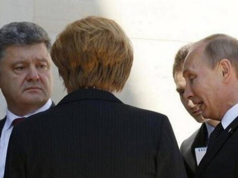 Путин обсудил с Меркель и Олландом мирный план Порошенко