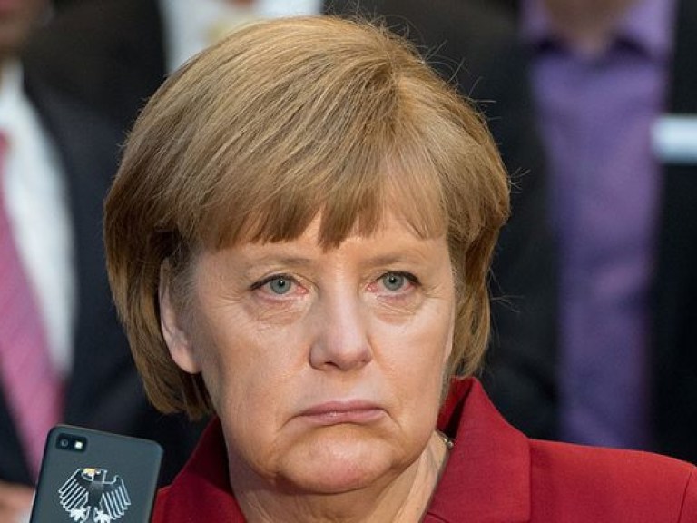 По результатам  встречи Меркель и Порошенко не все договоренности были озвучены &#8212; политолог