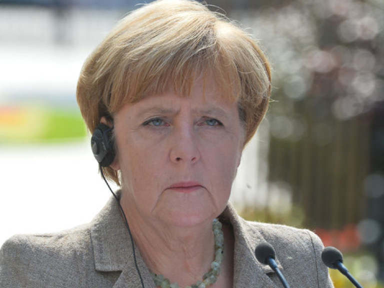 Меркель во время встречи с Порошенко в Милане раскритиковала выполнение мирного плана на Донбассе