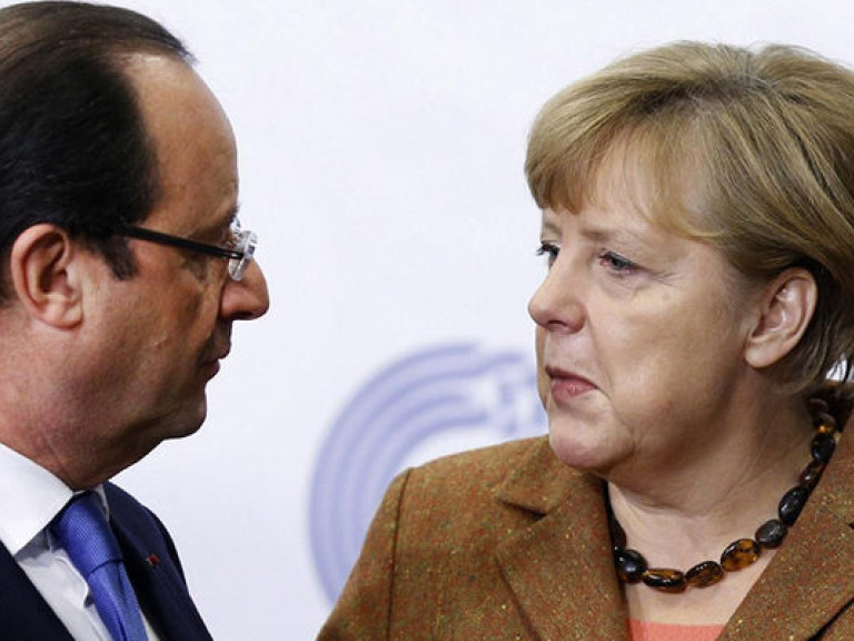СМИ: Мирный план Меркель и Олланда угрожает политическому будущему Порошенко