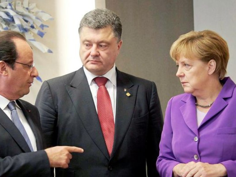 Порошенко в Германии поднимет вопрос пересмотра Минских договоренностей и замены миссии ОБСЕ миротворческими силами— политолог