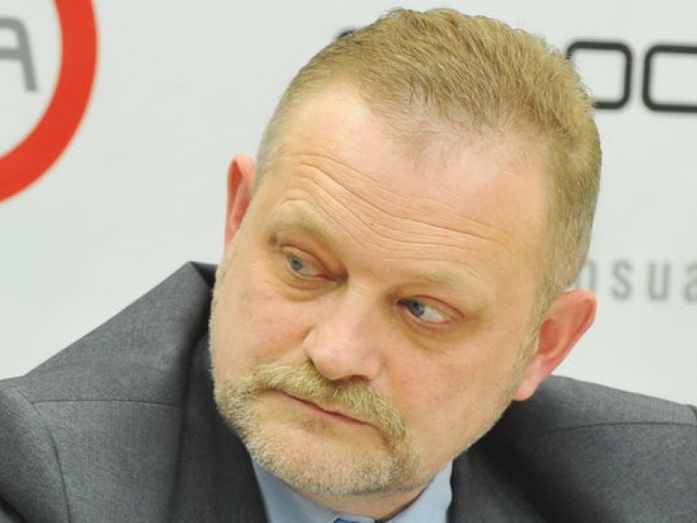 А. Золотарев: «Скандал с обвинением Кабмина Яценюка в коррупции может ударить по перспективам финансовой помощи Украине»