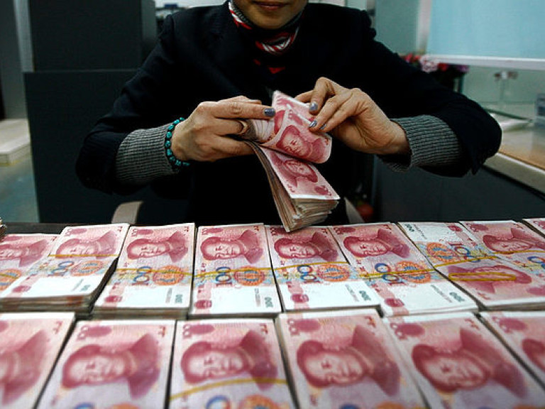 Китай увеличит использование своей денежной единицы на международной арене
