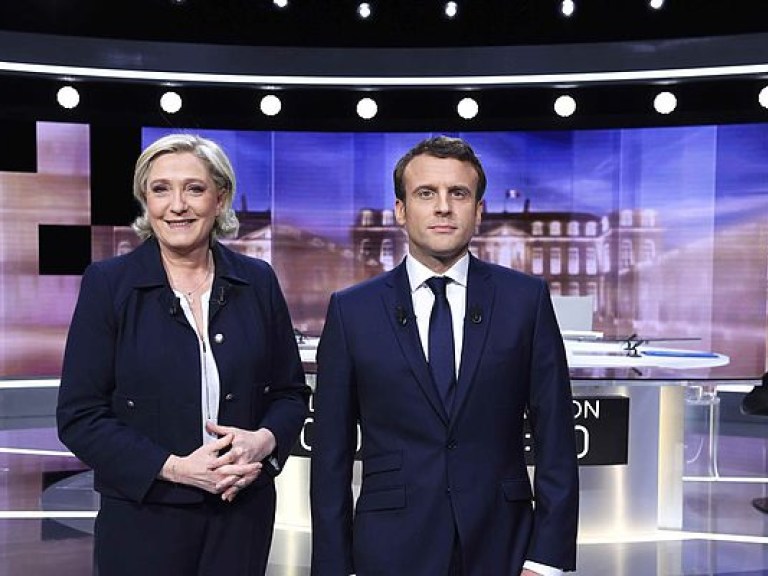 Выборы во Франции: Макрон опережает Ле Пен в соцопросах