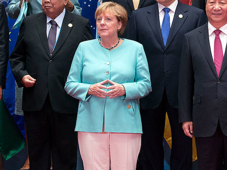 Меркель выступила против изоляции Трампа на саммите G20