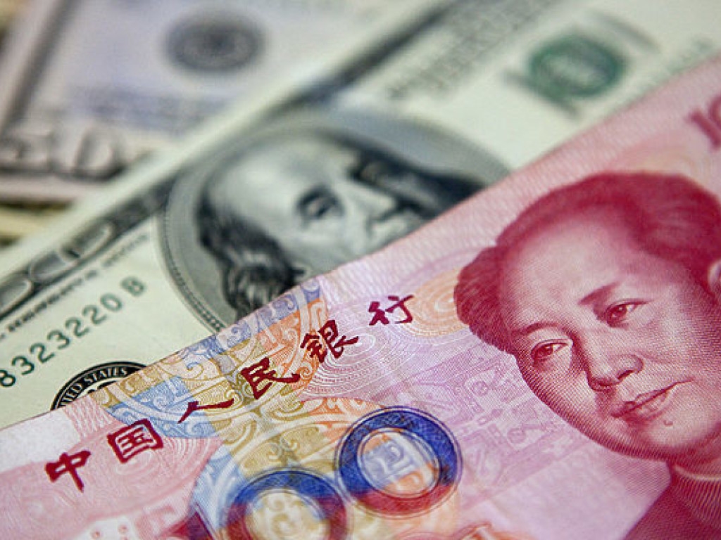 НБК укрепил курс юаня в отношении доллара до максимума за два года