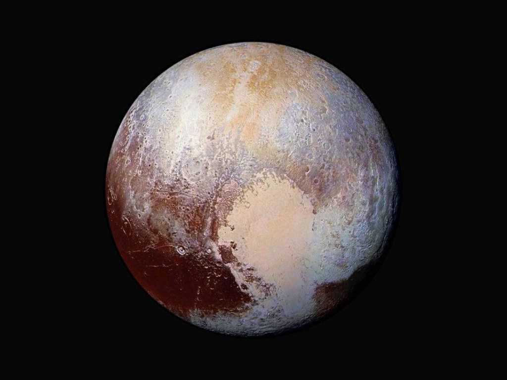 Ученые рассмотрели снимки Плутона и сделали удивительное открытие (ФОТО)