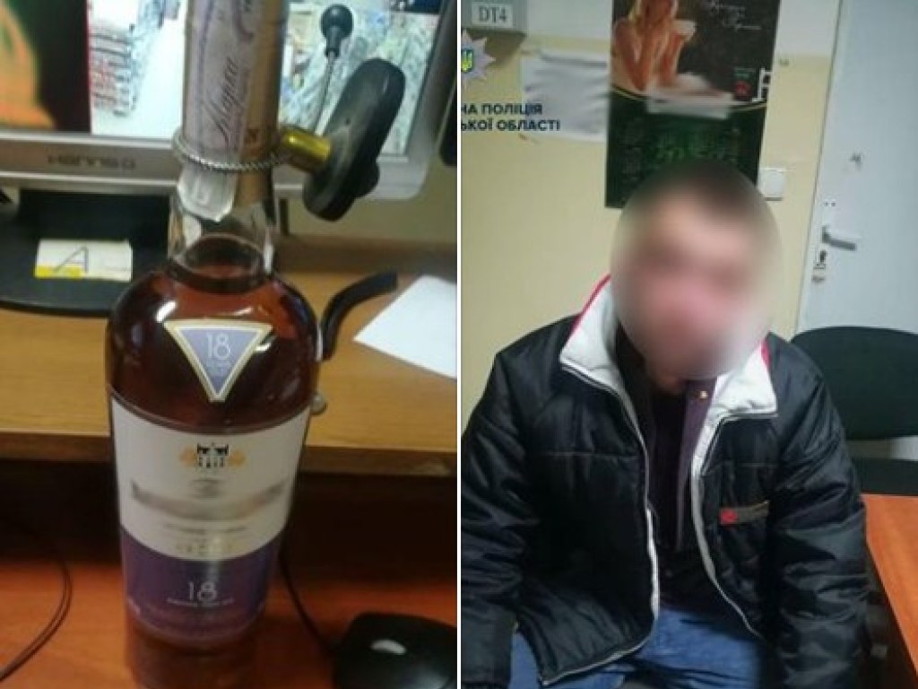 В Ужгороде мужчина попытался незаметно вынести из супермаркета алкоголь на 5 тысяч гривен (ФОТО)