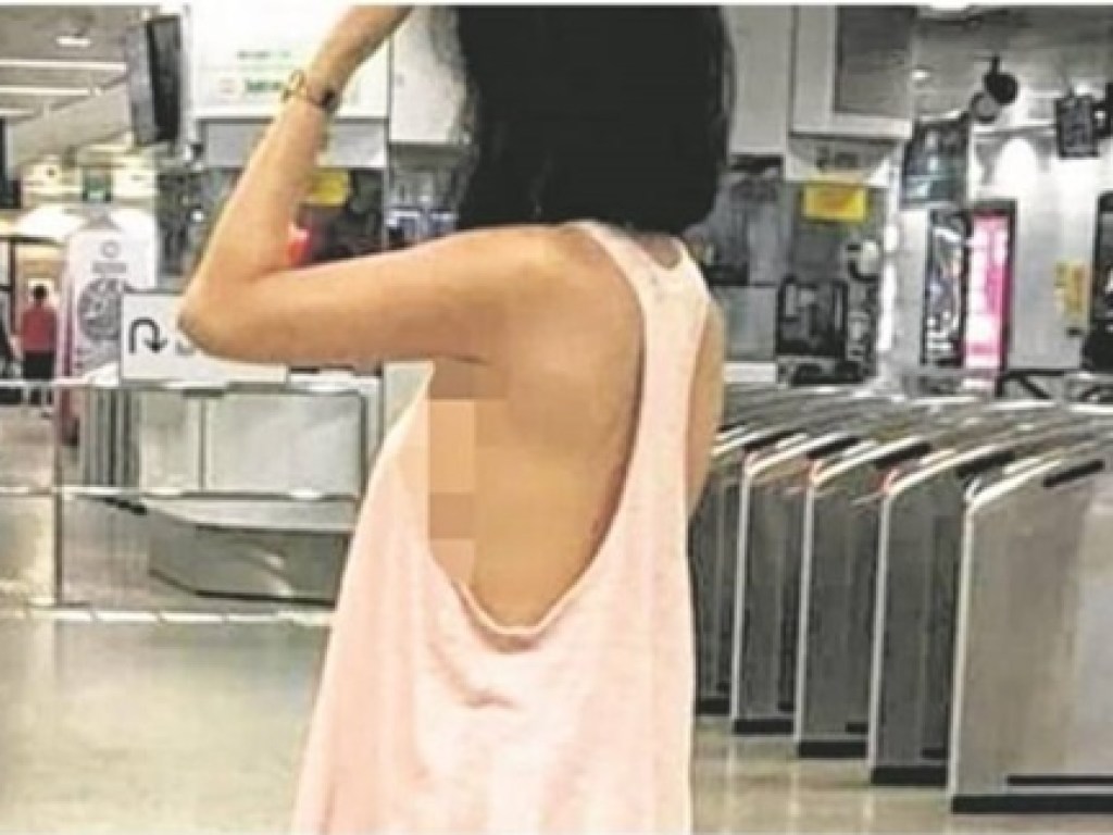 В метро Сингапура была замечена полуголая азиатка (ФОТО)