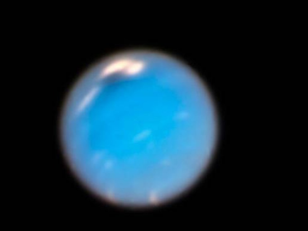 На Нептуне зарождается гигантский шторм: обнародованы уникальные фото Hubble