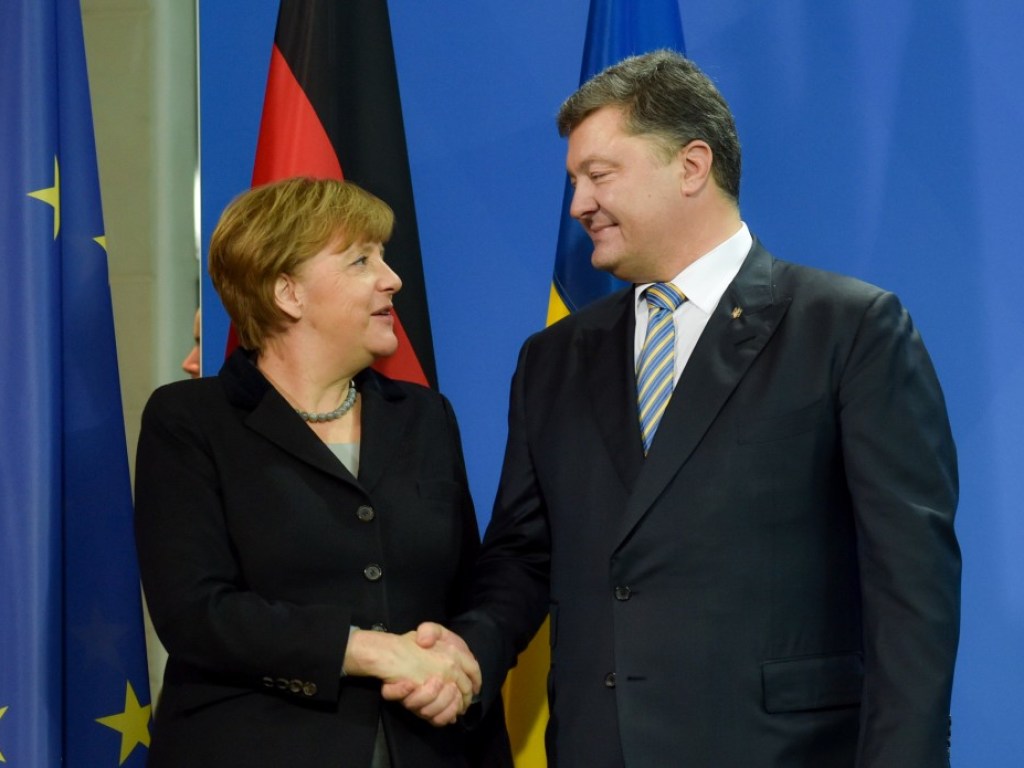 Порошенко и Меркель поддержали идею «пасхального перемирия» на Донбассе