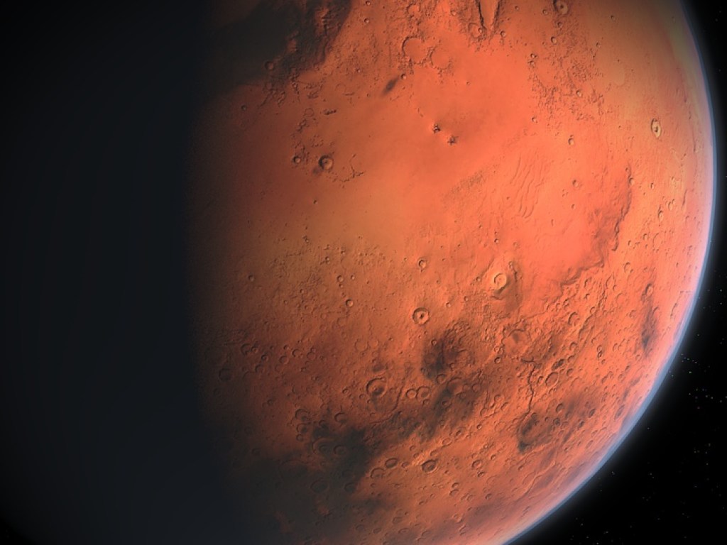 В северных широтах Марса обнаружили кратер, покрытый льдом (ФОТО)
