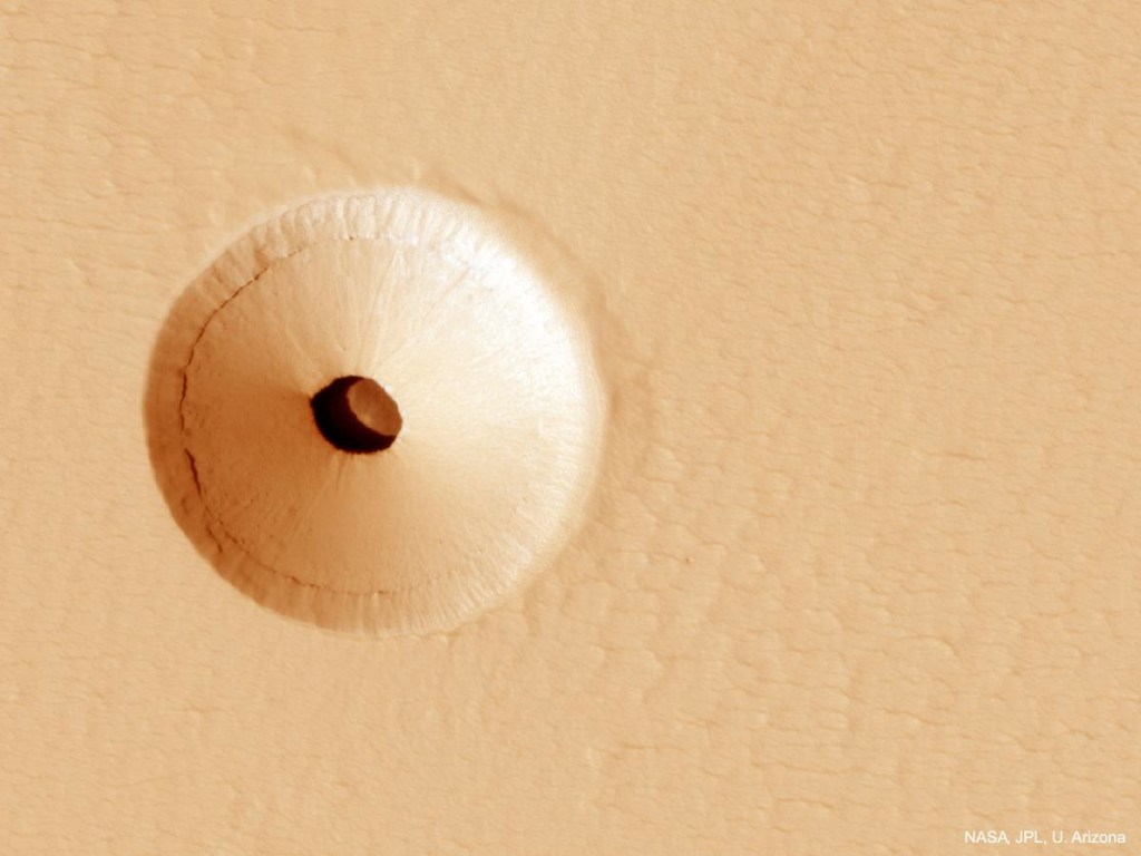 На Марсе ученые обнаружили загадочные пещеры (ФОТО)